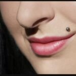 What’s the difference between a labret and Monroe piercing?